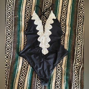 Black one-piece swimsuit